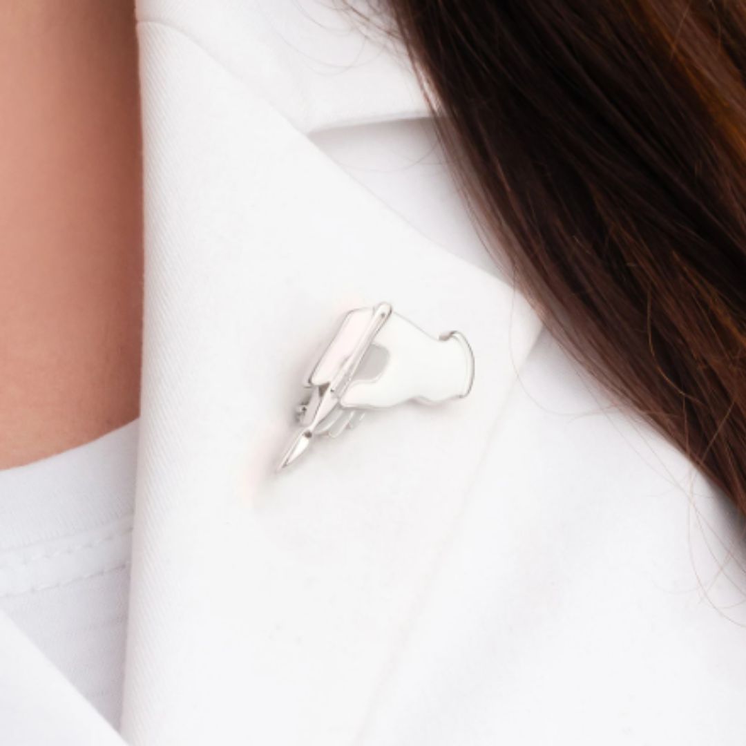 Dermaplaning Lapel Pin - Beauty Pro Supplies Canada