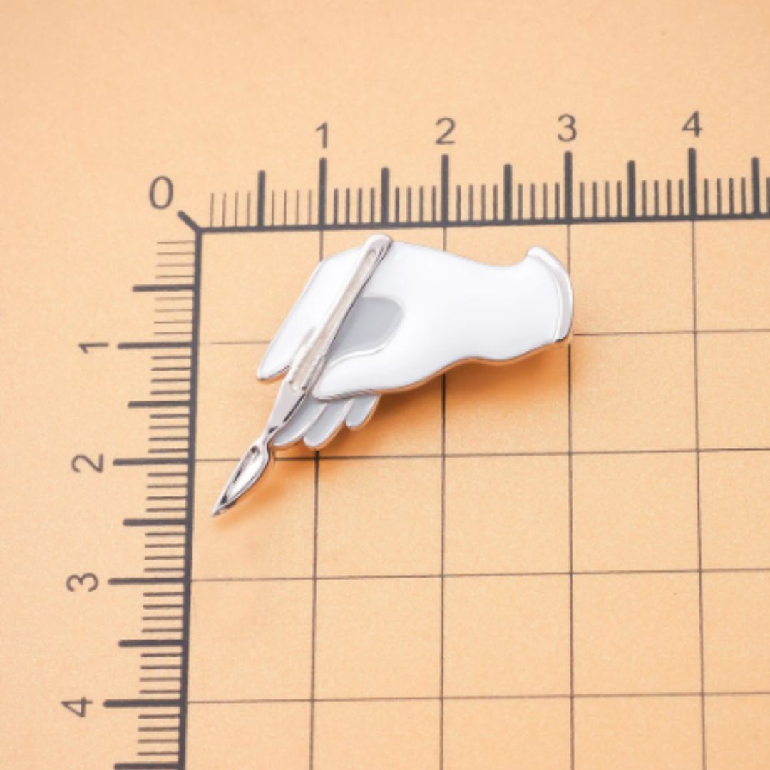 Dermaplaning Lapel Pin - Beauty Pro Supplies Canada